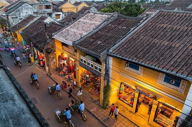 15-Day Private Tour - Vietnam Discovery & Phu Quoc Beach Escape - Da Nang to Hoi An: Japanese bridge photos with real town energy