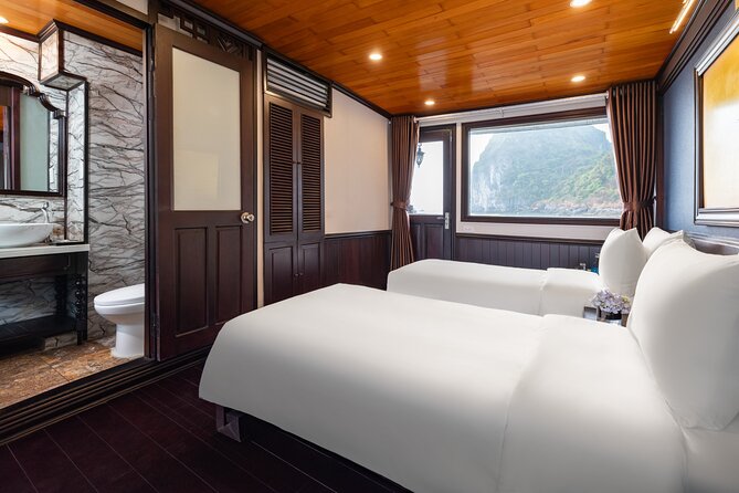 2-Day Boutique Cruise Discover Hidden Gems of Bai Tu Long Bay - Day 1 on the water: Bai Tu Long cruising, kayaking, and Cap La