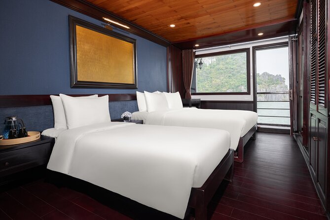 2-Day Boutique Cruise Discover Hidden Gems of Bai Tu Long Bay - Day 2: Tai Chi at sunrise and Vung Vieng by fisherman-rowed boat