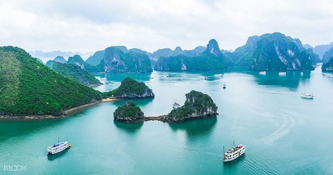 2-day Ha Long Bay Cruise included Transfer, Kayking and Swimming - Food on board: two lunches, one dinner, one breakfast, plus tea and snacks