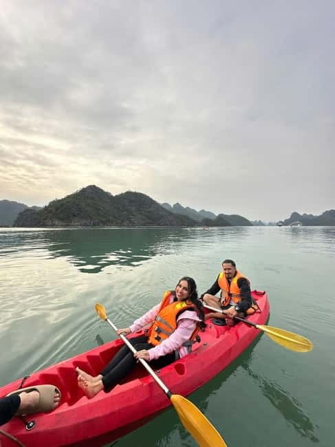 2-Day or 3-Day: Halong&Lan Ha Bay Cruise 5<em> balcony,bathtub – Key highlights that make this cruise worth a look’ /></p>
<ul>
<li><strong>Balcony + bathtub cabin</strong>: more comfort than the typical “basic cruise room.”</li>
<li><strong>Chef-guided Vietnamese cooking</strong>: spring rolls and other classics, not just a lecture.</li>
<li><strong>Lan Ha water time</strong>: kayaking/swimming around Tra Bau, plus hidden-island exploring.</li>
<li><strong>Viet Hai Village visit (3-day option)</strong>: bike or electric car through local roads.</li>
<li><strong>Dark & Bright Cave by kayak or bamboo boat</strong>: two different ways to move through the cave area.</li>
<li><strong>Sunset party and onboard fun</strong>: cakes/fruit/tea, happy hour, karaoke, and squid fishing.</li>
</ul>
<h2 id="a-5-balcony-and-bathtub-cabin-on-halong-lan-ha-bay">A 5<em> balcony-and-bathtub cabin on Halong-Lan Ha Bay</h2>
<p><img width="820" height="614" decoding="async" src=