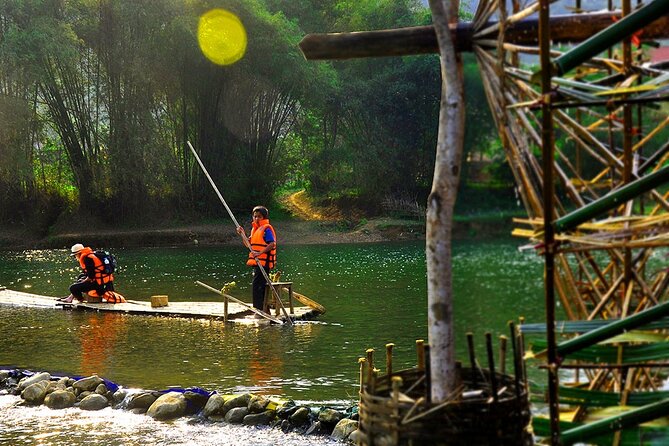 2 Days Pu Luong Offbeat Trekking Best for Mountain Lovers - Bamboo rafting at Chieu Lau dam: paddling with locals