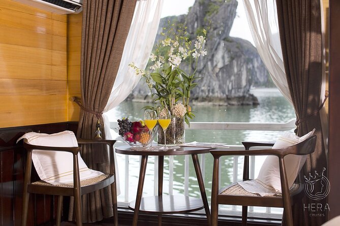 2 Days Tour of Halong Bay by Hera Cruise from Hanoi - Dark & Light Cave: tender transfer and a bamboo-boat ride