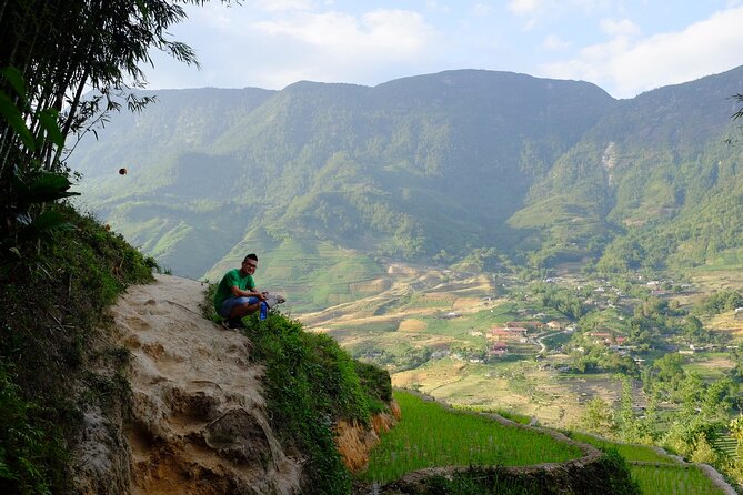 2D1N Buffalo trek by Hmong Sister House and Trekking - Day 2 Sunrise Trek: Rice Fields at Work, Red Dao Village, and a Waterfall Finish