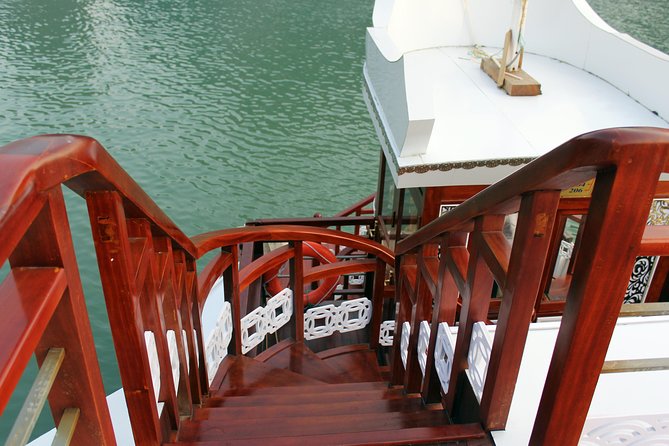 3-Day Cruise Relaxing and Kayaking on Oriental Sails - Day 2: dawn tai chi, peaceful anchoring, and kayaking in Lan Ha Bay