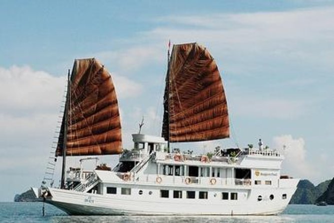 3-Day Luxury Bai Tu Long Bay Cruise on the Dragon Pearl Junk Boat - Entering Thien Canh Son Cave: the candlelit dinner moment