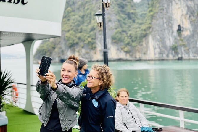 7 Days Explore Vietnam Trip - Ha Long Bay overnight cruise: Titov Island, Luon Cave options, sunset cooking class, then Sung Sot