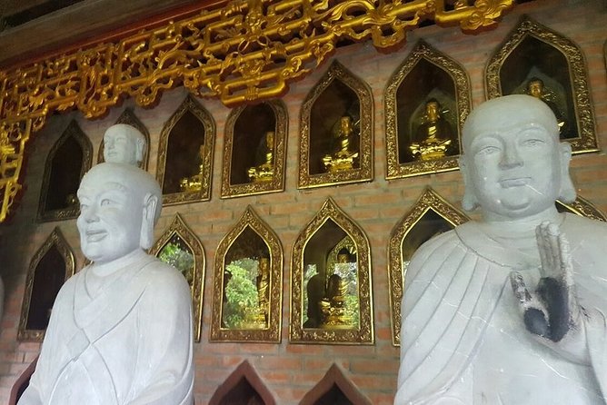 Bai Dinh, Trang An and Mua Cave Day Trip from Hanoi - Bai Dinh Pagoda: Electric Car Entry and the Statue-Spotting Rush