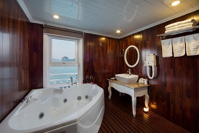 Bai Tu Long Bay 2 Day 1 Night Cruise - Bai Tử Long Bay is the point: calmer water, same wow factor