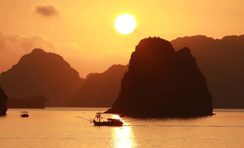 Bai Tu Long Bay 2 Days 1 Night With Renea Cruise - Day 1: cruising in, Cap La Island kayaking, and sunset party energy
