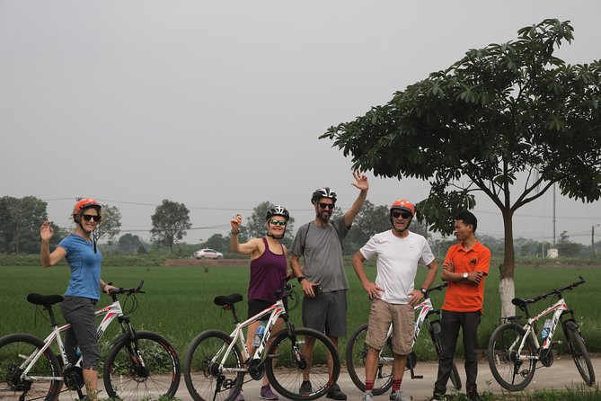 Bicycle Tour Full Day Explore Red River Delta & Rural Villages - Guides matter in Hanoi traffic: why names keep coming up