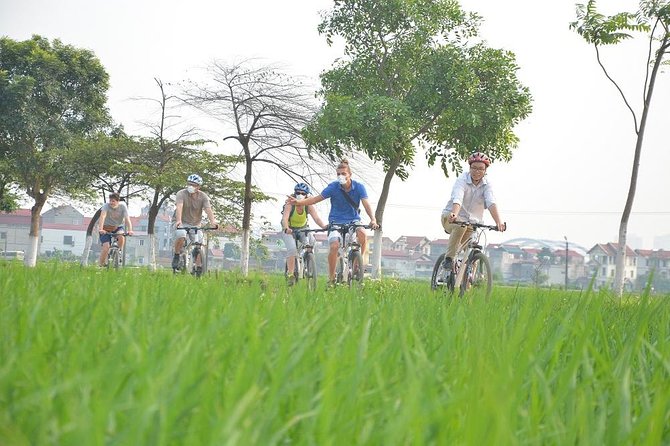 Bicycle Tours Hanoi: Full Day Bicycle Tours City & Countryside - Huu Tiep Lake and the downed B-52: one stop with real weight