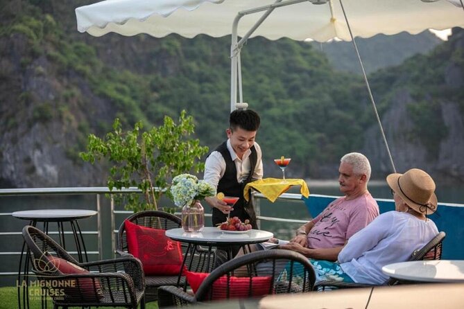 BOUTIQUE CRUISE 2 Days 1 Night Explore Lan Ha Bay & Cat Ba Island - Dark & Bright Cave: kayaking, bamboo boat option, and a water-jump