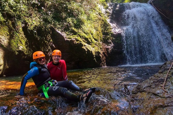 Canyoning Tour from Sapa Vietnam - Entering Hoang Lien National Park by rope, water, and jungle steps