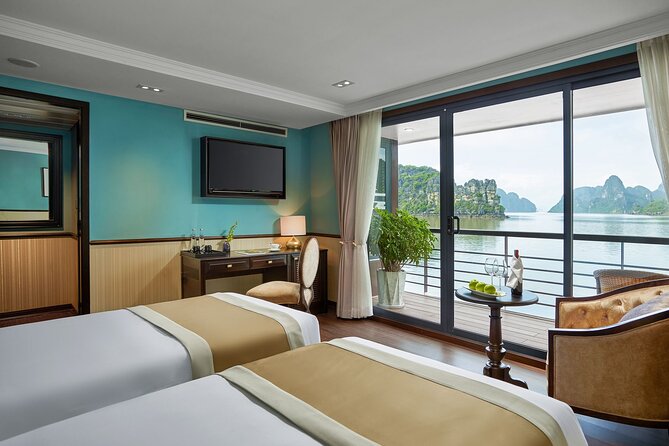 Capella Cruise 3-day Explore Halong Bay and Lan Ha Bay from Hanoi - Day 3: Tai Chi sunrise, Dark & Bright Cave by bamboo boat, then brunch and goodbye