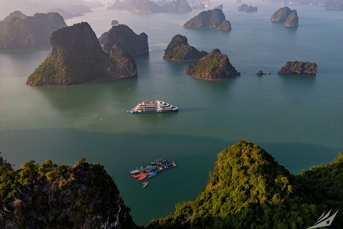 Capella Cruise Halong Bay 2Day/1 Night 6 Star Cruise All Included - Day 1 at Sea: Caves, Islands, Beaches, and the Evening That Starts Near Sunset
