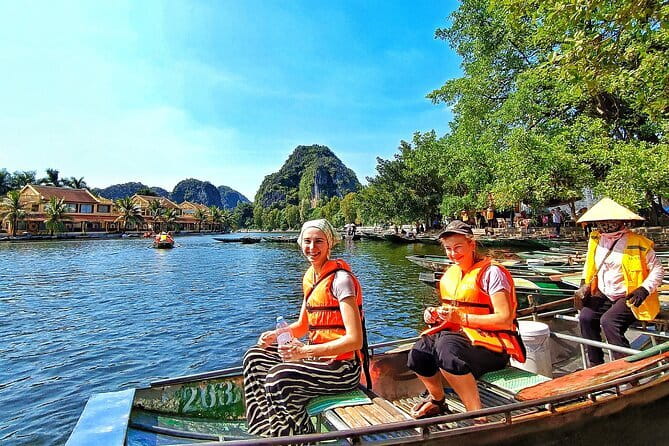 Catamaran Premium Cruise to Halong Bay & Lan Ha Bay in 1 Day Tour - Lan Ha Bay afternoon: kayaking or bamboo boat, Bright–Dark Cave, then Frog Pond