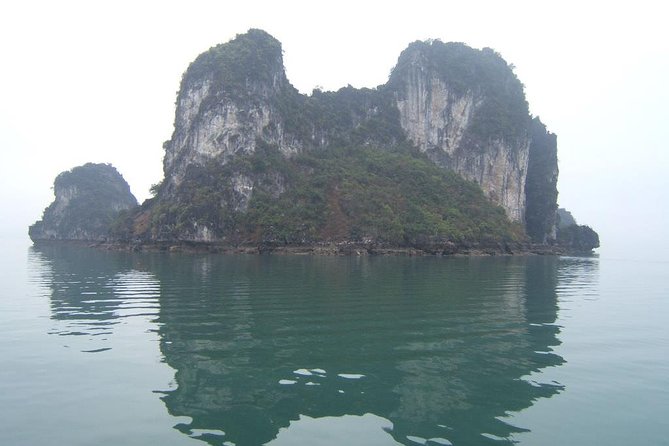 Deluxe Halong Bay 6 Hours Cruise To Visit Surprising Cave And Titop Island - Service and guides: what makes the day feel “deluxe”