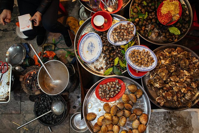 Drinks & Bites in Hanoi Private Tour - The Red Bridge, Tuồng Theatre, and the Water Puppet Stage Explained