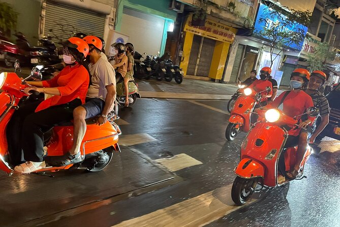 Female Riders Vespa Night Street Food + Train Street food 4 Hours - The ride setup: pickup at 6:00 pm, helmets, and what to expect