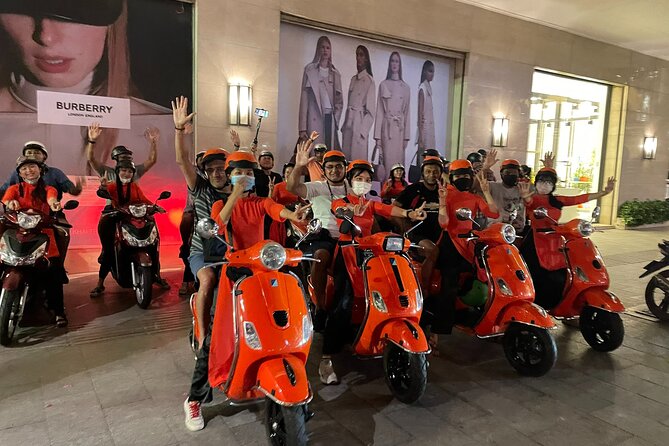 Female Riders Vespa Night Street Food + Train Street food 4 Hours - The Long Bien ride: ceramic road, Chuong Duong Bridge, and night views