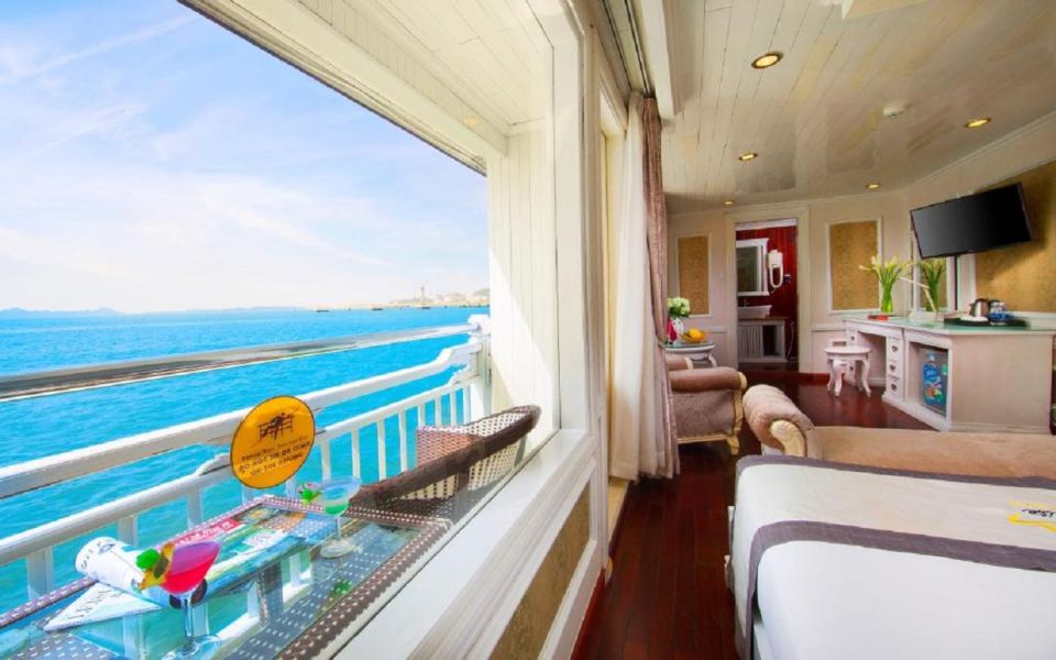 From Hanoi: 2-Day Bai Tu Long Bay Luxury Cruise with Jacuzzi - Getting value out of the on-deck routine: Tai Chi, bar time, squid fishing