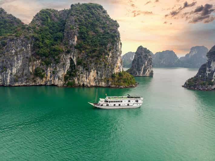From Hanoi: 2-Day Ha Long Bay Boat Tour - Cabins, Air-Conditioning, Food, and the Boat-Versus-Modern Reality