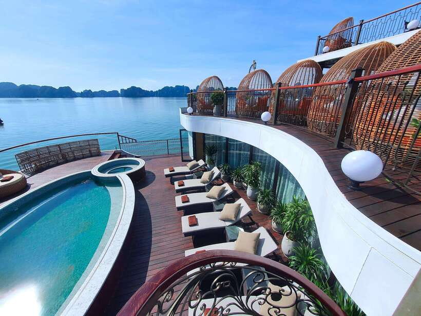 From Hanoi: 2-Day Ha Long Bay by Indochine Premium Cruise - Day 1 on the water: caves, caves, and then a chef at dinner