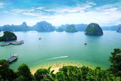 From Hanoi: 2-Day Ha Long Bay Tour with Ninh Binh and Cruise - Day 1 on Ha Long Bay: Sung Sot, Titop, Luon Cave Kayak, Sunset Party