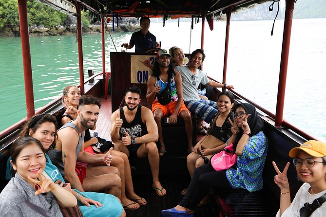 From Hanoi: 2D1N Ha Long Bay Deluxe Cruise with Bus Limousine - Day 2 in Ha Long: Tai Chi, Sung Sot Cave, and Morning Energy