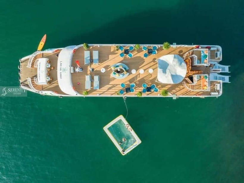 From Hanoi: Cat Ba Island and Lan Ha Bay Cruise Day Trip - Back to Beo Pier: top-deck relaxation and the sunset fruit party