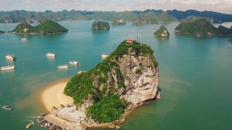 From Hanoi: Halong Bay Cruise 2 Days 1 Night With Transport - Day 1: Lunch on the Bay, Titop Island Hike, and a Sundeck Sunset