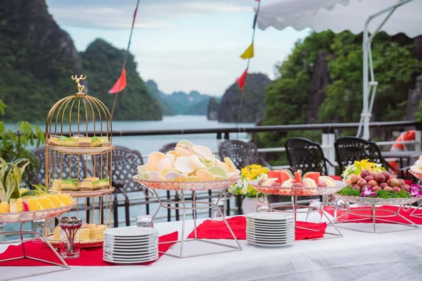 From Hanoi: Halong Bay Seaplane & 6-Hour Ha Long Bay Tour - Luon Cave at Ba Hang Fishing Village: kayaking or bamboo about 40 m