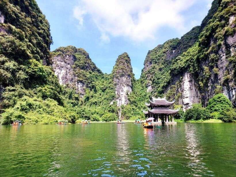 From Hanoi: Ninh Binh, Bai Dinh, Trang An and Mua Cave Trip - Trang An UNESCO Boat Ride: Slow Motion Beauty in the Caves
