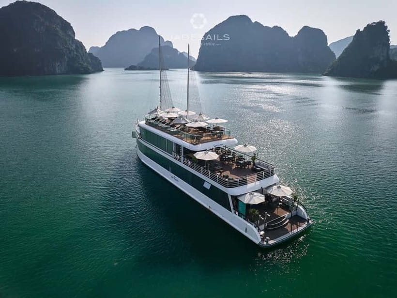 From Hanoi: Top-Rated Ha Long Bay Day Cruise with Jade Sails - Sunset party at 4:30 PM: wine, fruit, and a deck moment