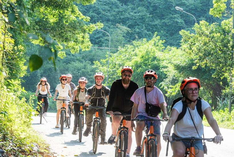 From Hanoi: Trang An, Hoa Lu & Mua Cave Full-Day Luxury Tour - Bike through village life: the break that changes the day