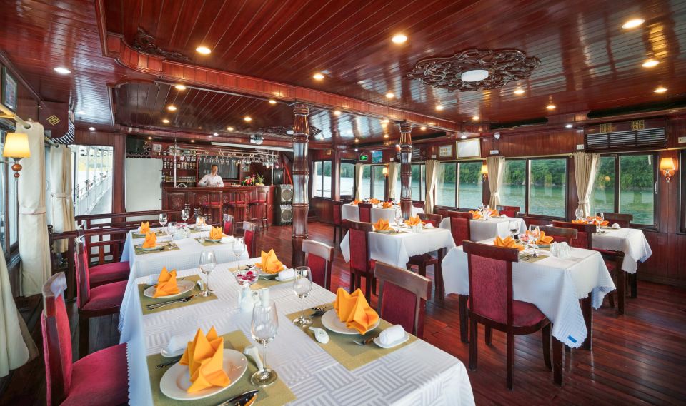 From Ninh Binh: Ha Long Bay 2 days 1 night on 3-star Cruise - Day 2: sunrise deck, tea/coffee, pearls, and the best kayaking window