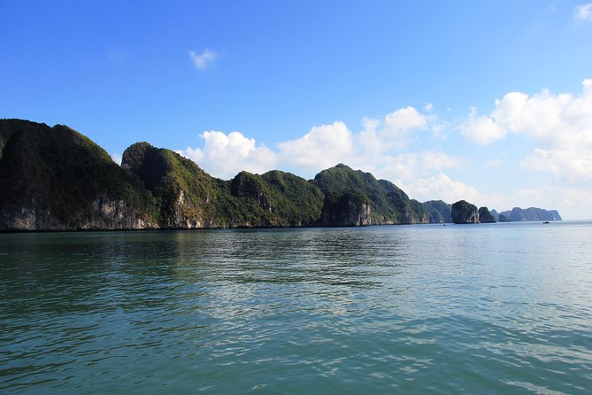 Full day boat trip with Cat Ba Captain Jack to Lan Ha Bay and Ha Long Bay - Cruising Lan Ha Bay: Cai Beo village and UNESCO karst views
