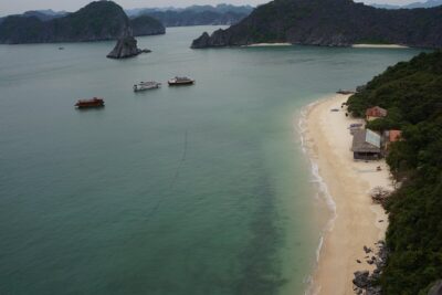 Full day boat trip with Cat Ba Captain Jack to Lan Ha Bay and Ha Long Bay - Floating house stop and kayak time through rock-arch tunnels