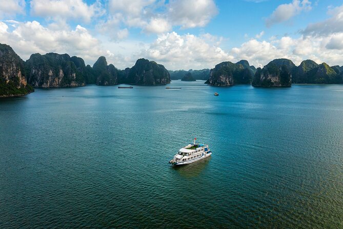 Full-Day Halong Bay Cruise with Limousine Pickup - Hang Luon Cave: kayaking choice and the local rowboat experience