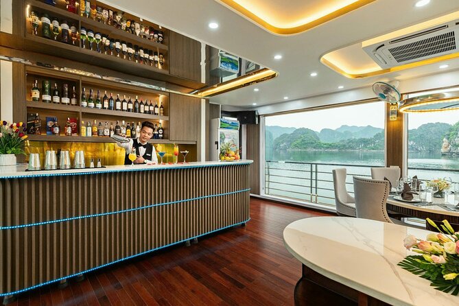 Full day Halong Bay Luxury Cruise - buffet lunch, kayak, swim. - Luon Cave area: kayaking, wet clothes risk, and a calmer ride