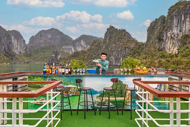 Full Day Halong Bay Luxury Limousine Bus & Buffet Lunch - Hang Luon Cave: kayaking or a bamboo boat on calm water