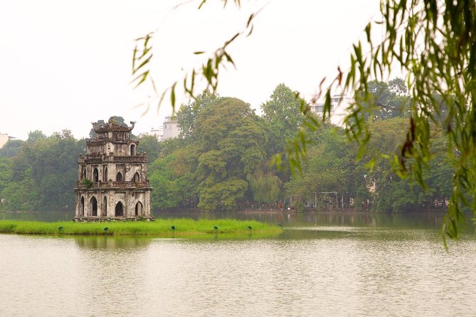 Full-day Private Hanoi Sightseeing Tailored on request - Duong Tau Train Street and Hoa Lo Prison: Two Different Kinds of Hanoi