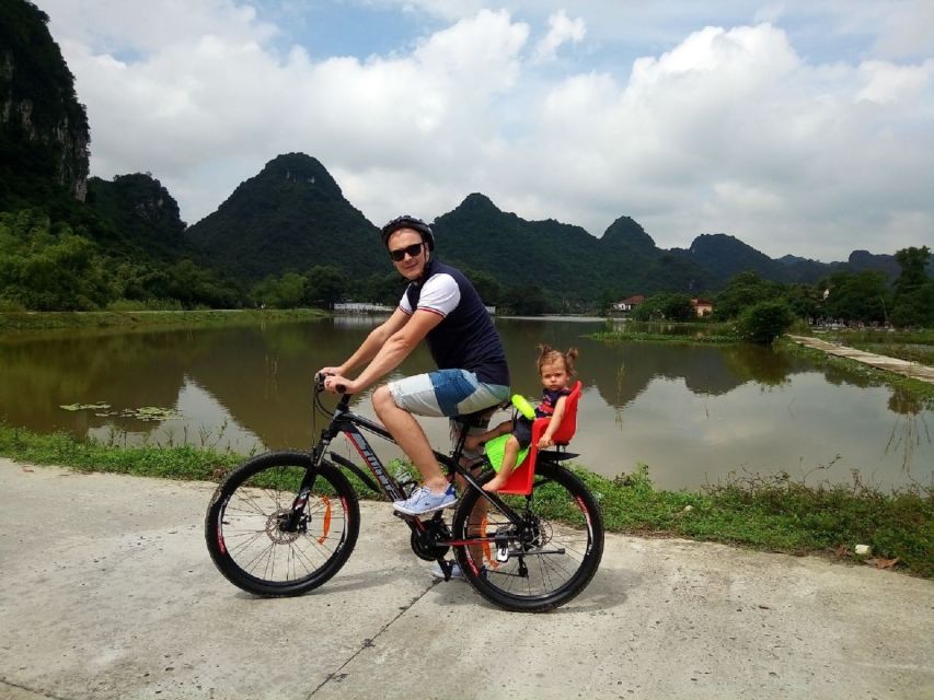 Full Day Trang An, Bich Dong Pagoda, Biking & Family Visit - Trang An Boat Time: Caves, Temples, and Limestone Everywhere
