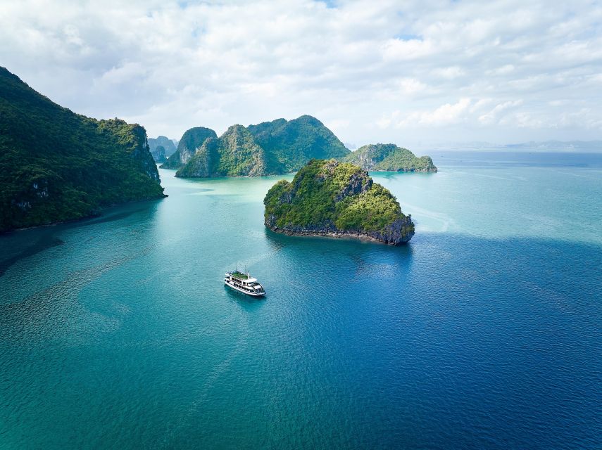 Ha Long & Bai Tu Long bay cruise wt Kayakking & buffet lunch - TiTop Island: beach break, swim option, and the viewpoint trek