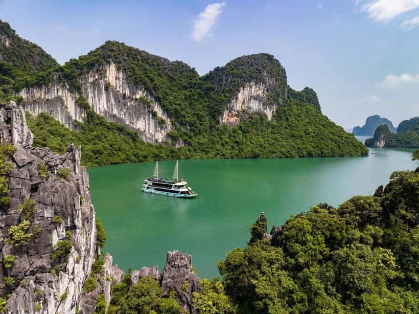 Ha Long Bay Cruise w/ Jacuzzi, Kayak & Limo from Hanoi - Sunset party: wine, tea, fruits, biscuits while the cruise heads back