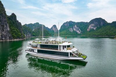 Ha Long Bay Luxury Day Cruise with Buffet Lunch, Caves & Kayaking - Ti Top Island: swim and the viewpoint hike (with rules about anchoring)