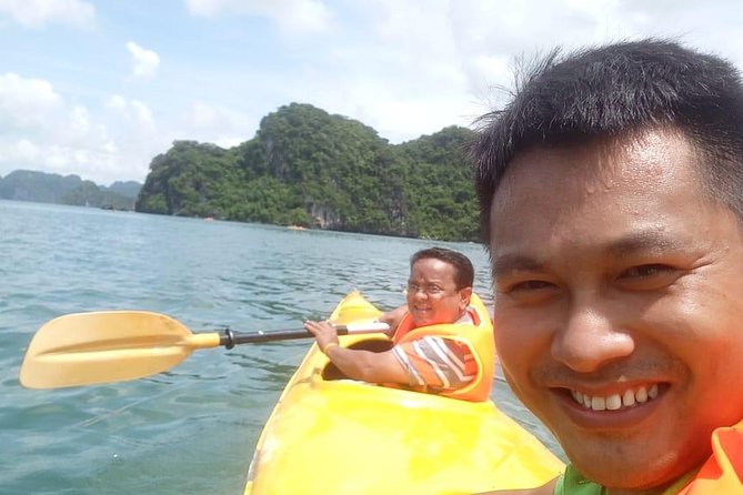 Ha Long Bay Six Hours Trip Kayaking & Swimming on Beach - Bo Hon archipelago and Surprising Cave: stalagmites, sea-life shapes, and timing