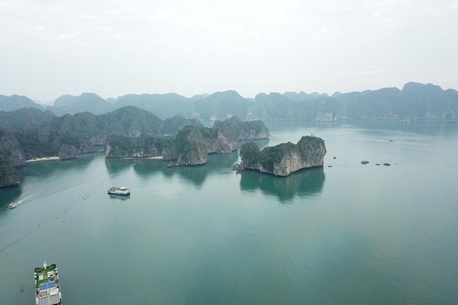 Ha Long Bay Six Hours Trip Kayaking & Swimming on Beach - Luon Cave kayaking or bamboo boat: the best way to feel Ha Long Bay up close