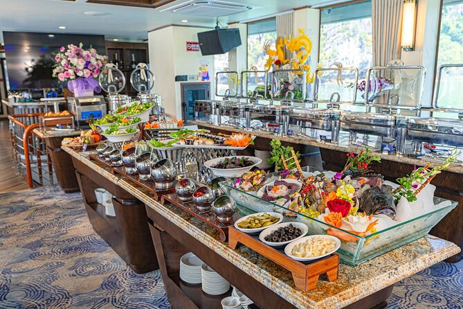 Ha Long Symphony Cruise Luxury Day Tour from Harbor with Pick up - Ti Top Island: Beach Time and a Swim Window